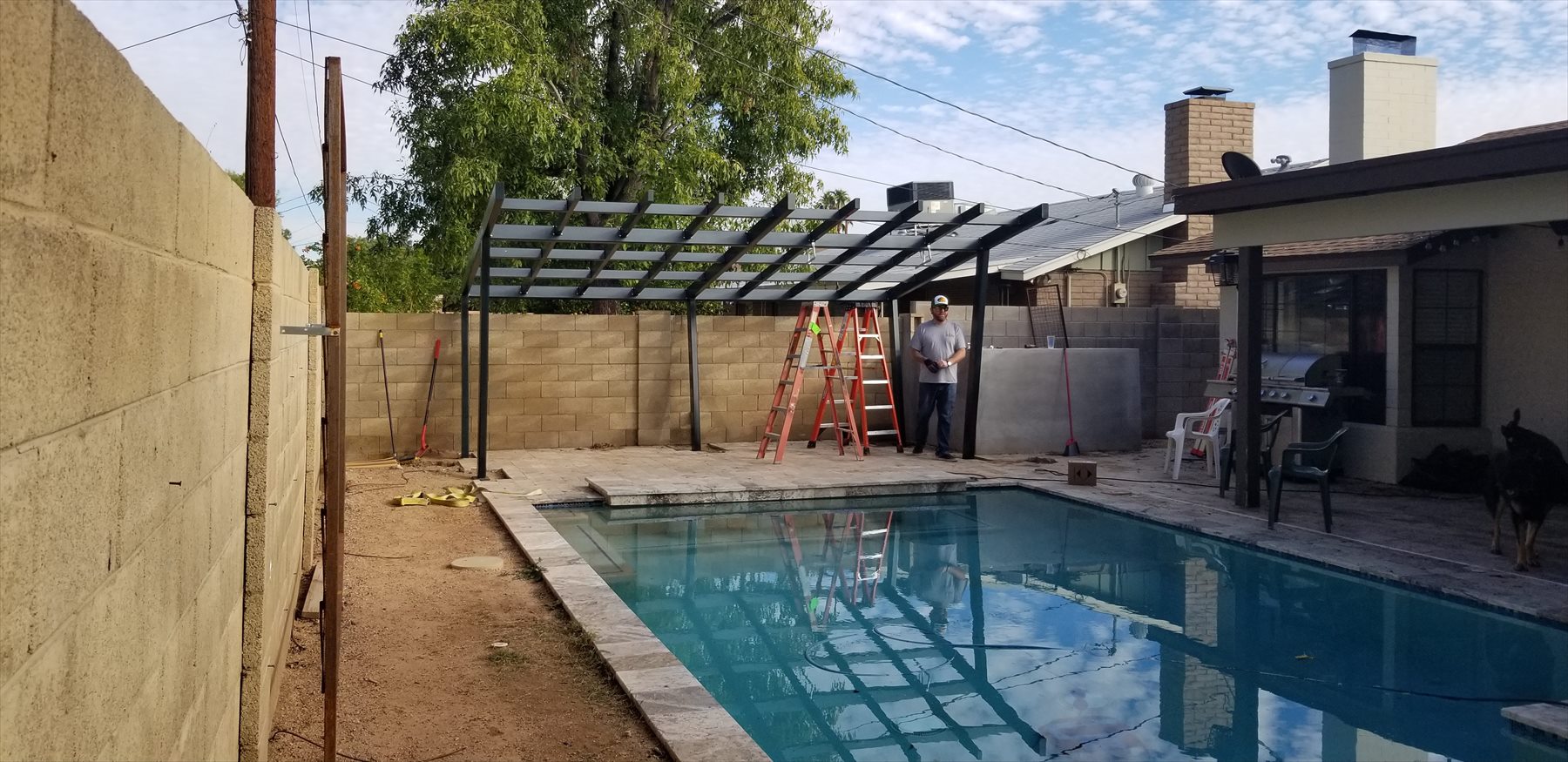 Steel pergola from pool side